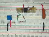 An analog accelerometer on a protoboard with conditioning circuit An analog accelerometer on a protoboard with conditioning circuit